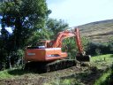 Digger Preparing Ground