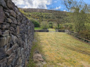 Wall and mountain