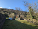 Barn below the mountain